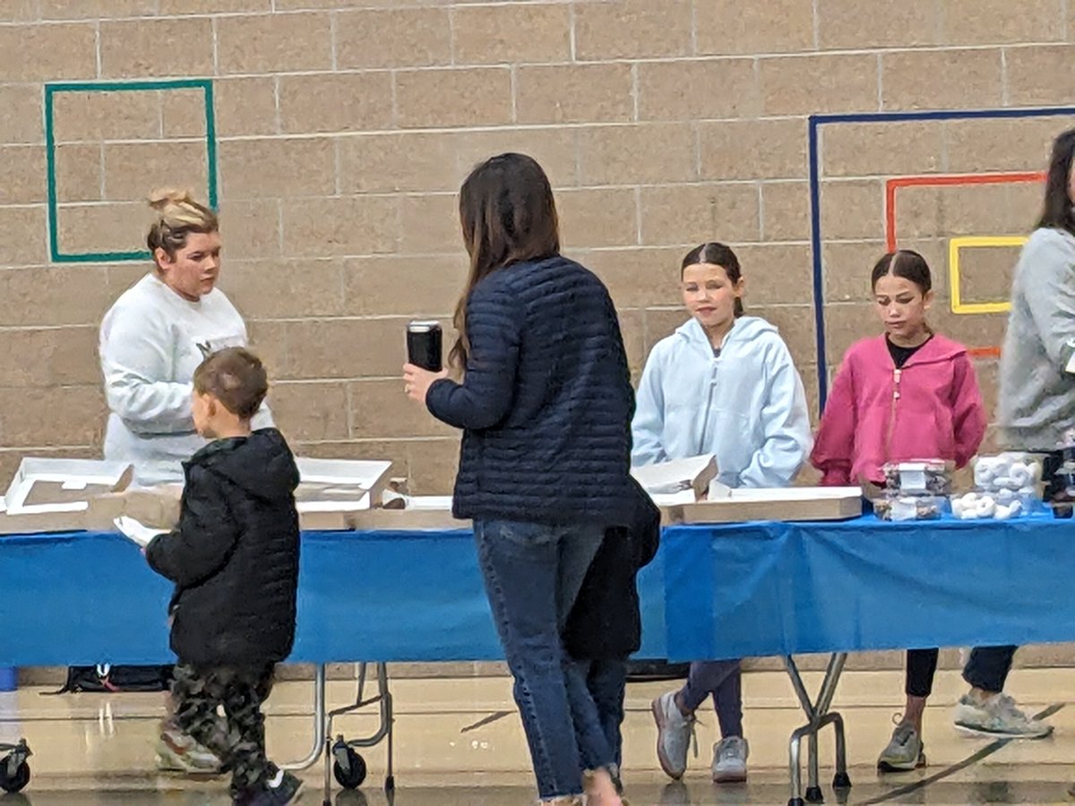 Clara Barton-Hawthorne Elementary School students got an energy boost before school on May 3 at the Donuts with Grownups event. Students invited an important grownup to join them for a donut and spend some quality time with them before school started for the day.