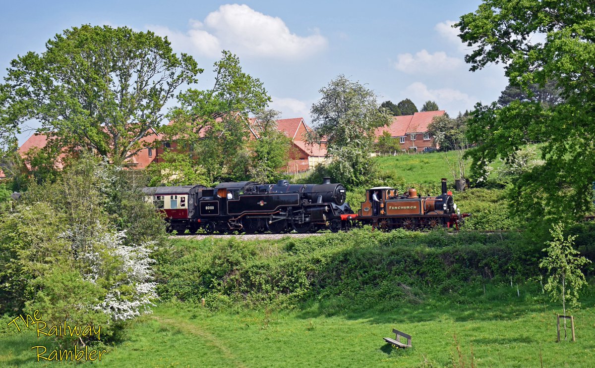 The Brighton Boys: A brief gap in the trees allows for a view of Nos. 72 Fenchurch and 80151 (alias 80100) as they climb through Hill Place Farm towards Imberhorne Lane during the @bluebellrailway branch line gala.