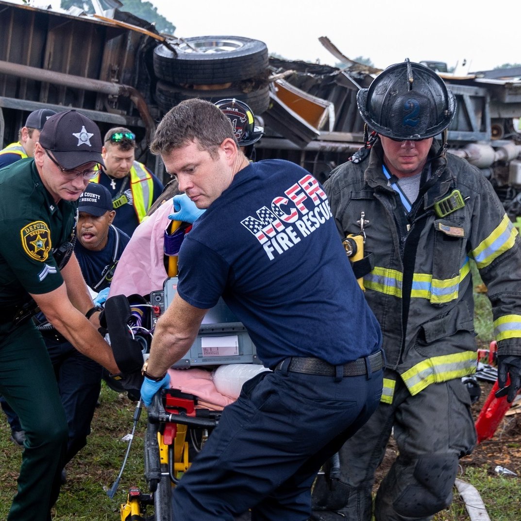 PARAMEDICS IN ACTION: In this photo, first responders worked to save a victim of a Florida bus crash that killed eight people and hospitalized 38 others. Read more: bit.ly/4bGLMwl (Photo courtesy of the Marion County Fire Rescue)