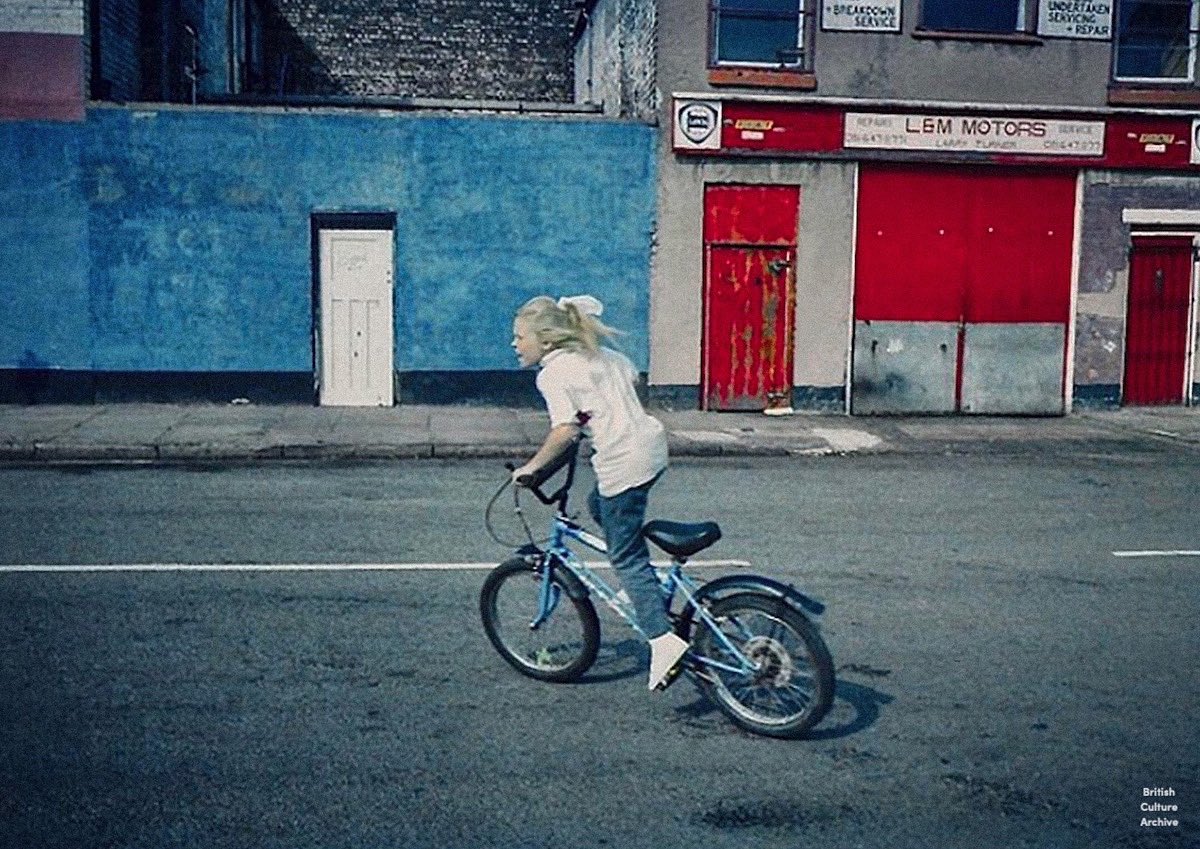 Girl on a Raleigh Grifter, Birkenhead, 1988. Photo © Nick Wynne, all rights reserved.