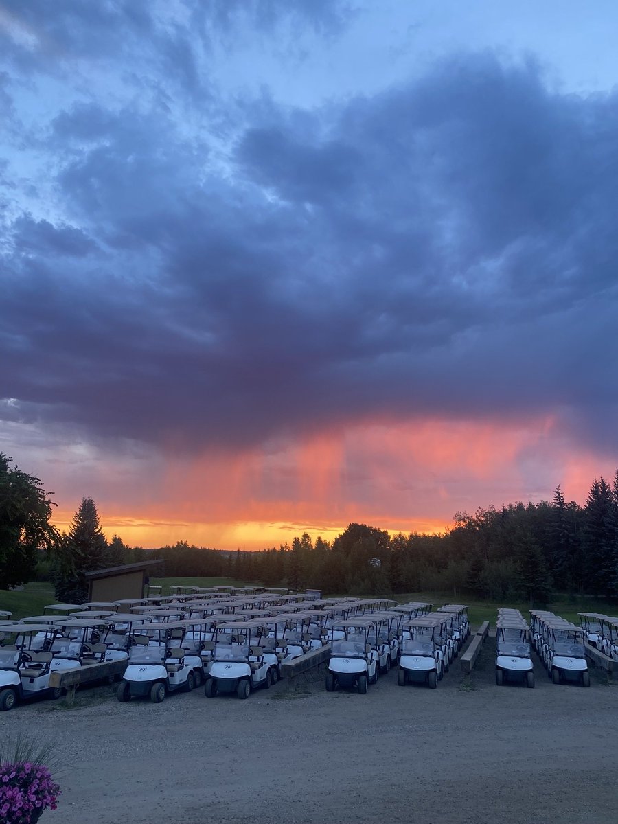 We love a good stormy sunset! No better view of our @EZGOvehicles fleet! 🌥️#Yeggolf #albertagolf #golf #EZGO #sunsetphotography