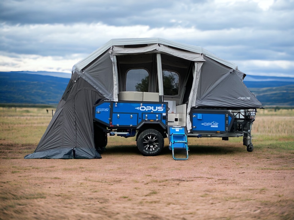 Blue #OP2 looking good with the rear shower tent set-up 🔥Comes with a hot water heater, large shower/privacy tent… and tons of storage. #opuscampers #overlanding #offgrid #explore #adventure #adventurefurther #offroadcampers #offroadtrailers #offroadlife #offroadliving