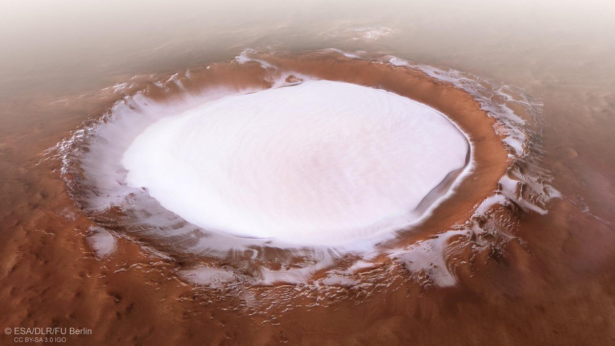 Korolev crater, 82km wide, lies in Mars' northern lowlands near Olympia Undae. Remarkably preserved, it holds a perennial 1.8km thick ice. This image was captured by ESA’s Mars Express. NASA