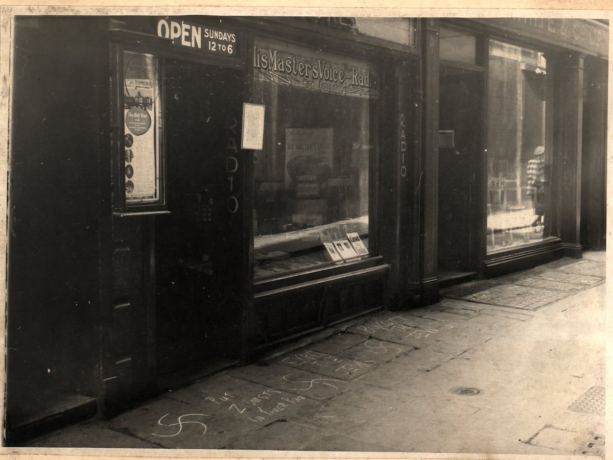 I want to share something personal. 

This is a picture of my grandfather’s gramophone store on Johnson’s Court circa 1940. 

Inscribed in chalk in front of the store  are swastikas and the following:

‘Put the Zionists in their place’. 

‘Expel the Jews’. 

‘Boycott the Jews’.