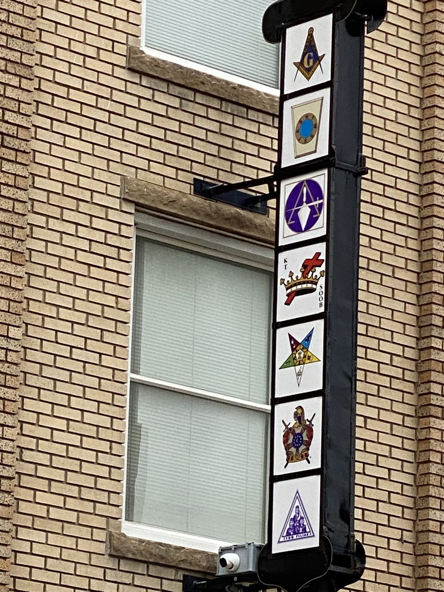This sign adorns the front of the Masonic lodge in my town.

Anyone know the meaning behind each of the separate symbols on the sign?