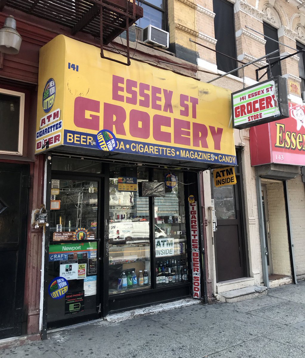 Essex St Grocery. 141 Essex St. New York, NY. (DG Archive: August 2019). #deligrossery #essexstgrocery #essexstreet #essex #les #lowereastside #manhattan #delimeat #storefront #coldcuts #bodega #deligrocery #delicatessen #deli #sandwich #sandwiches #lunch #breakfast #snack #hero