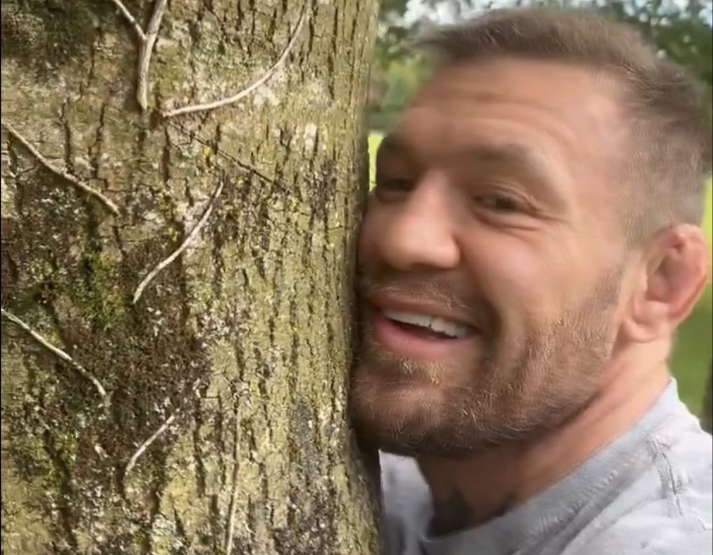 Conor McGregor has shown off his nature-loving side by sharing a video of him hugging a tree ahead of his UFC comeback fight mirror.co.uk/sport/other-sp…