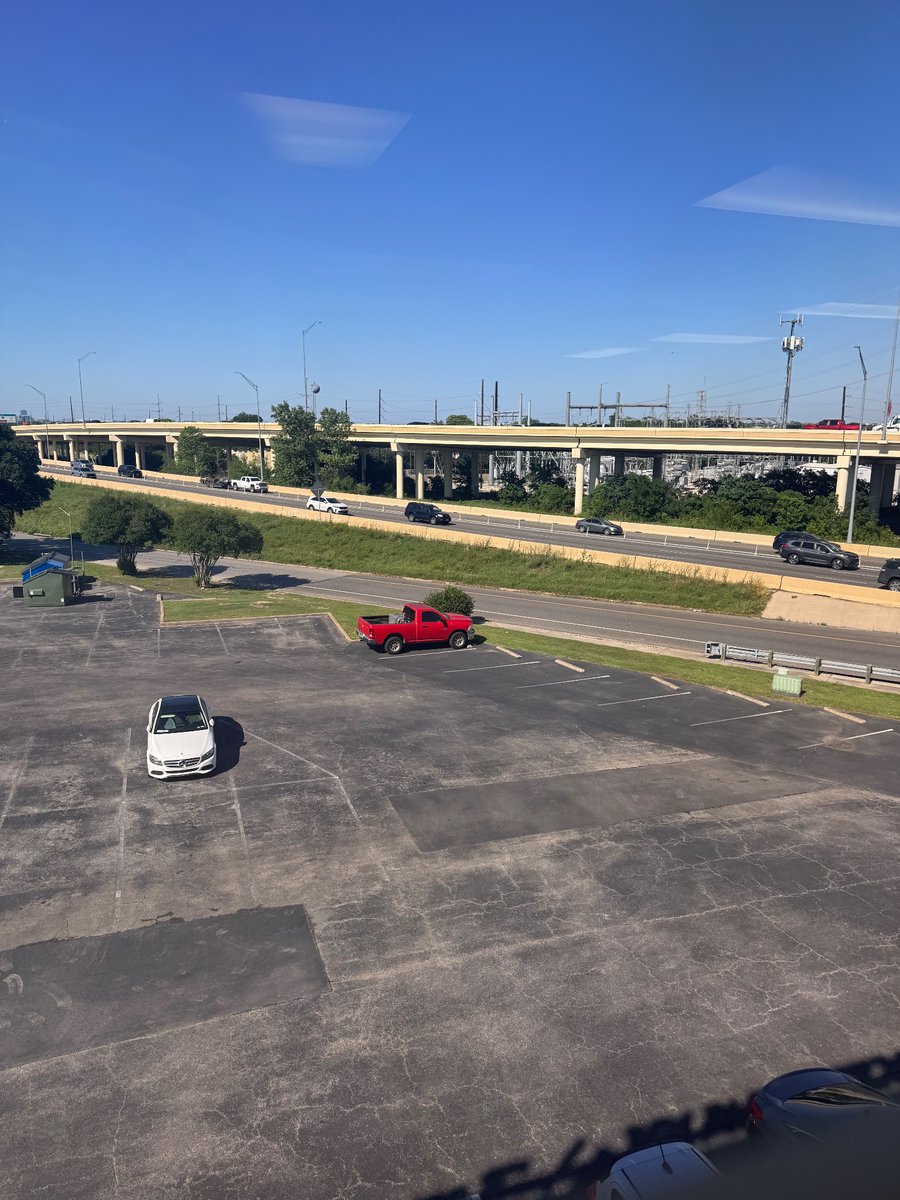 New office has windows. With a “view” of a parking lot, and my BFF @EvilMopacATX and a gorgeous @austinenergy substation. I know. You’re jealous. It’s okay. 😂😂😂