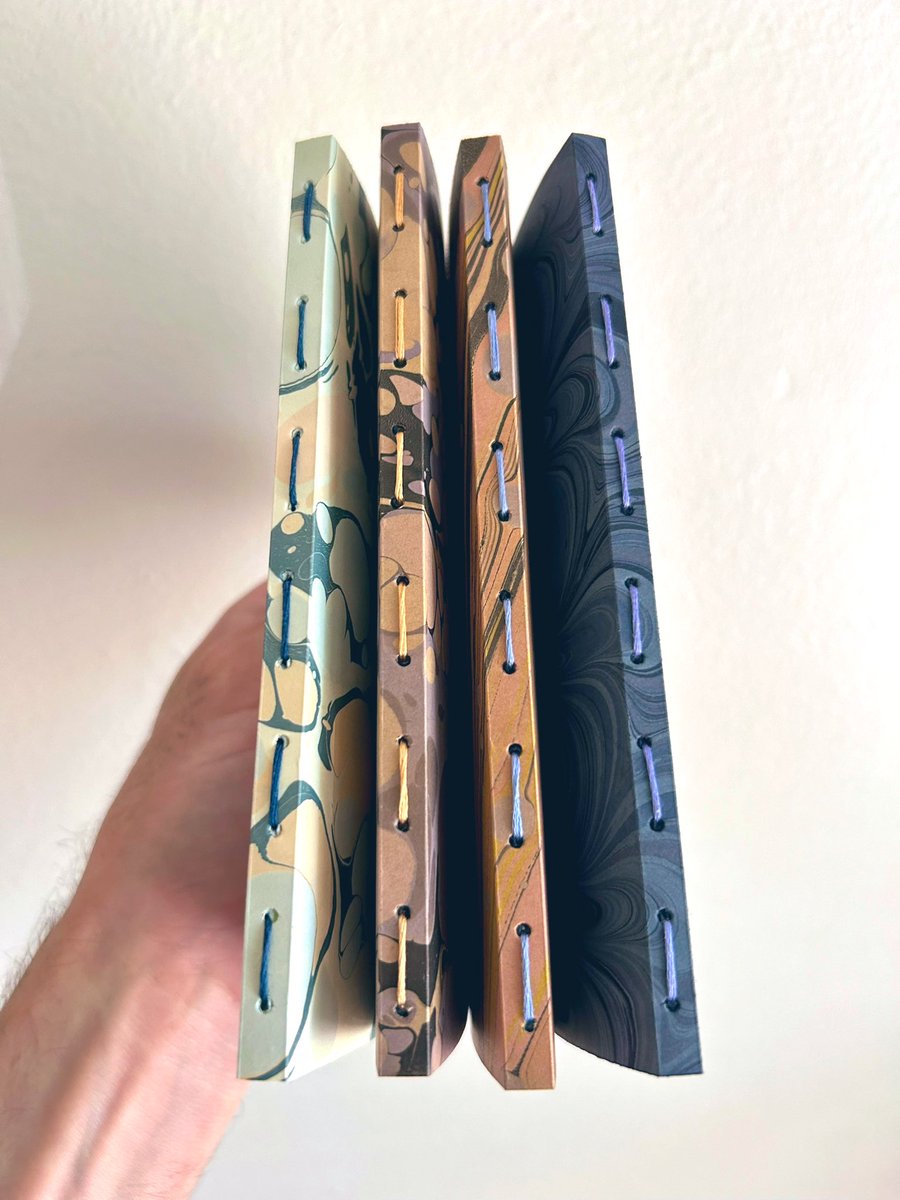 nautiluspaper's tweet image. A few new marbled notebooks completed! I’m keeping one of these for myself but I’ll probably add the others to Etsy in a few days! 📒📖✍️
#notebook #journaling #bookbinding #EtsyHandmade
