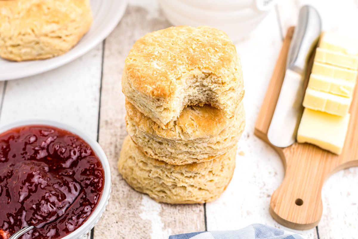 Buttermilk biscuits with flaky layers, that are super easy to make. You'll never bother with canned biscuits again! Freezer instructions included #biscuits #buttermilk #homemade #recipe #baking #kyleecooks kyleecooks.com/buttermilk-bis…