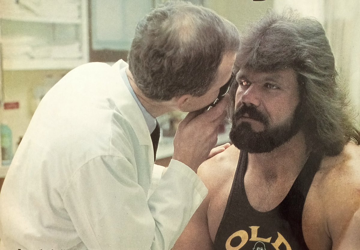 'Dr.Death' Steve Williams,getting his right eye checked by his opthalmologist,not long after his eye was injured back in 1985.'Doc' of course,famously received 108 stitches above his eye and,true to his tough form,wrestled the next night