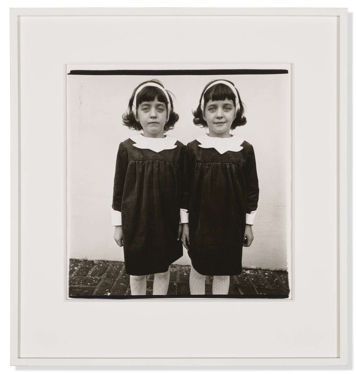 #ArtistRecord Diane Arbus's most celebrated work, ‘Identical twins, (Cathleen and Colleen), Roselle, New Jersey, 1966’ has sold for $1,197,000 during tonight's #21stCenturyEveningSale