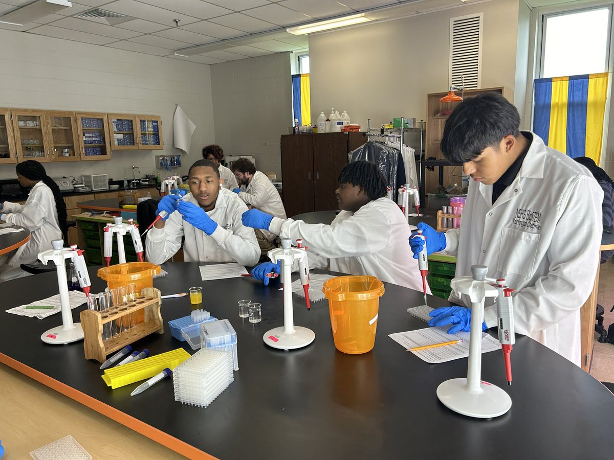 BioSTEM 1 students practicing micropipetting technique. Next semester, they will be working on CRISPR, Biofuels, and GMO vs NonGMO. Our lab is amazing.