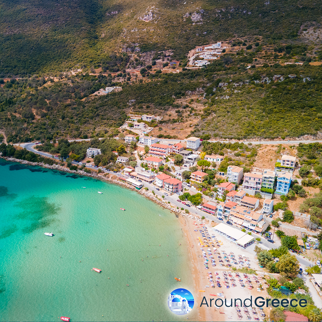Indulge in the laid-back charm of Vasiliki Beach in Lefkada, where pristine turquoise waters and soft golden sands create a tranquil paradise. Known as a windsurfing hotspot, thrill-seekers can catch the perfect breeze and ride the waves, while sunbathers can relax under the