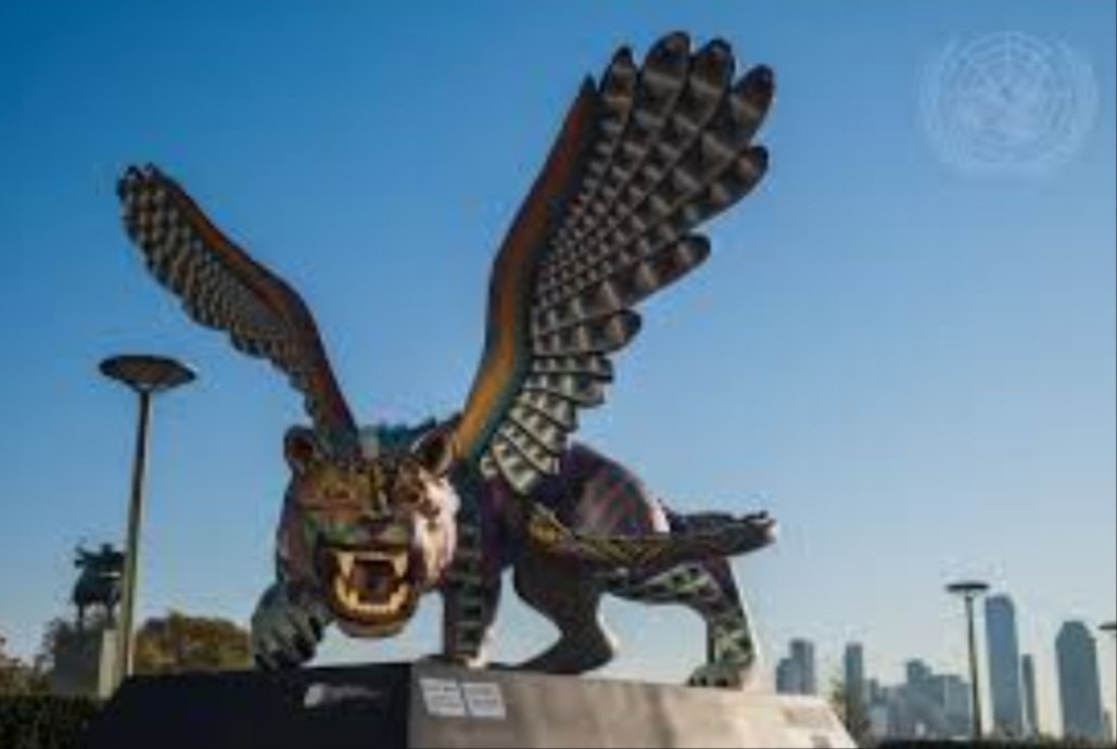 The Bible, Daniel 7 and Revelation 13 says a beast with a body of a leopard, feet of a bear, tail of a snake, a mouth of a lion, and wings of a fowl is given a throne with dominion from the dragon (Satan). The statue of this beast sits today in front of the U.N. (United Nations).