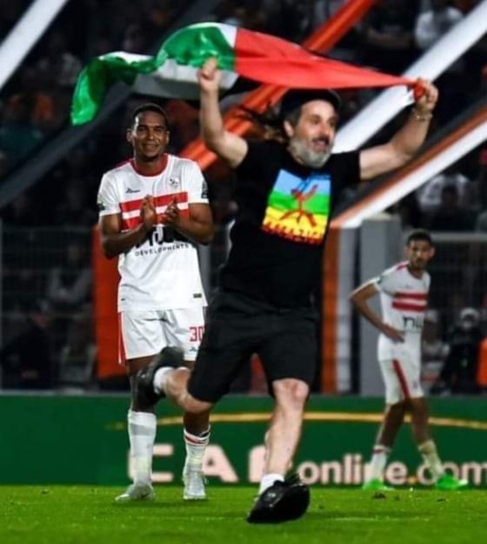 During a football match between Moroccan club RSB Berkane and Egypt's Zamalek in Morocco, a pitch invader rushed to the field while raising the Palestinian flag. Follow Press TV on Telegram: t.me/presstv