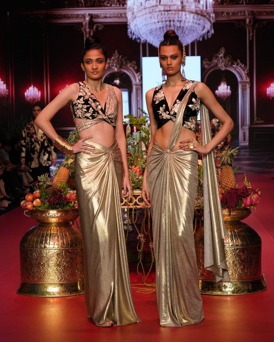Experience the bold drama of Advaya by Vikram Phadnis, transcending boundaries with pulsating reds, deep blacks, and sophisticated ivory. Each garment embodies passion, elegance, and mysterious allure. #BombayTimesFashionWeek24