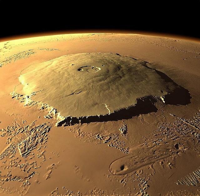 The tallest mountain in the solar system, Olympus Mons on Mars. It has a height of 25 km, Mount Everest is 'only' 8.8 km tall.