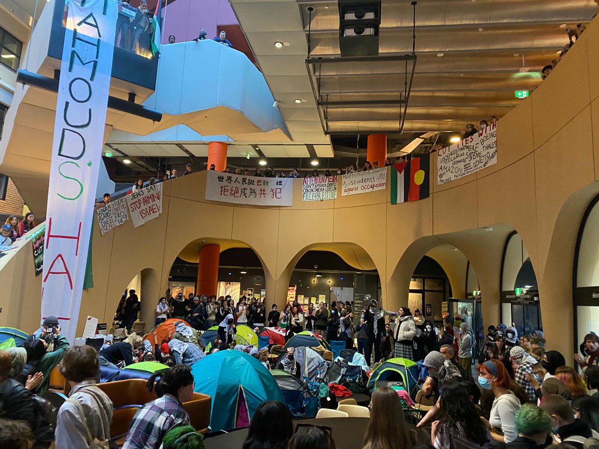 Whilst staff form a defensive picketline outside the newly named 'Mahmouds Hall' at Melbourne Uni, students set up tents inside the building. The university refuses to negotiate & threatening police action. Support needed. 

Divest Now! Staff & students unite for Palestine.