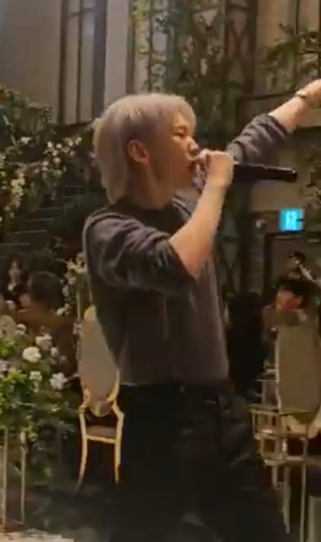 hoshi in gray longsleeves tucked in black slacks and wearing a wristwatch OH GOD