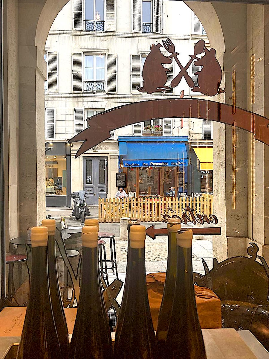 Wine Wednesday: wines wait beneath a counter to be tasted and tested. #wine #frenchwines #springtimeinparis #leftbank #winebars