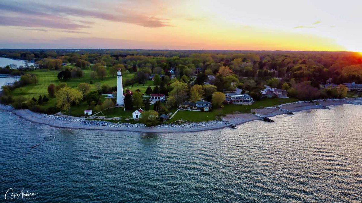 Today's featured Wisconsin photographer is Chris Ambrose who captured this serene scene over Wind Point. 📸