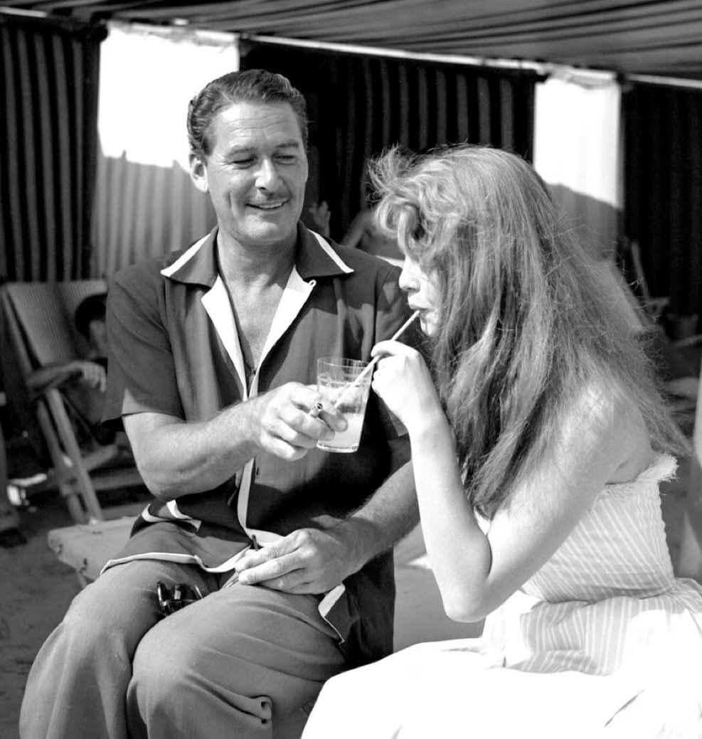 Errol Flynn and Brigitte Bardot - Cannes, 1956