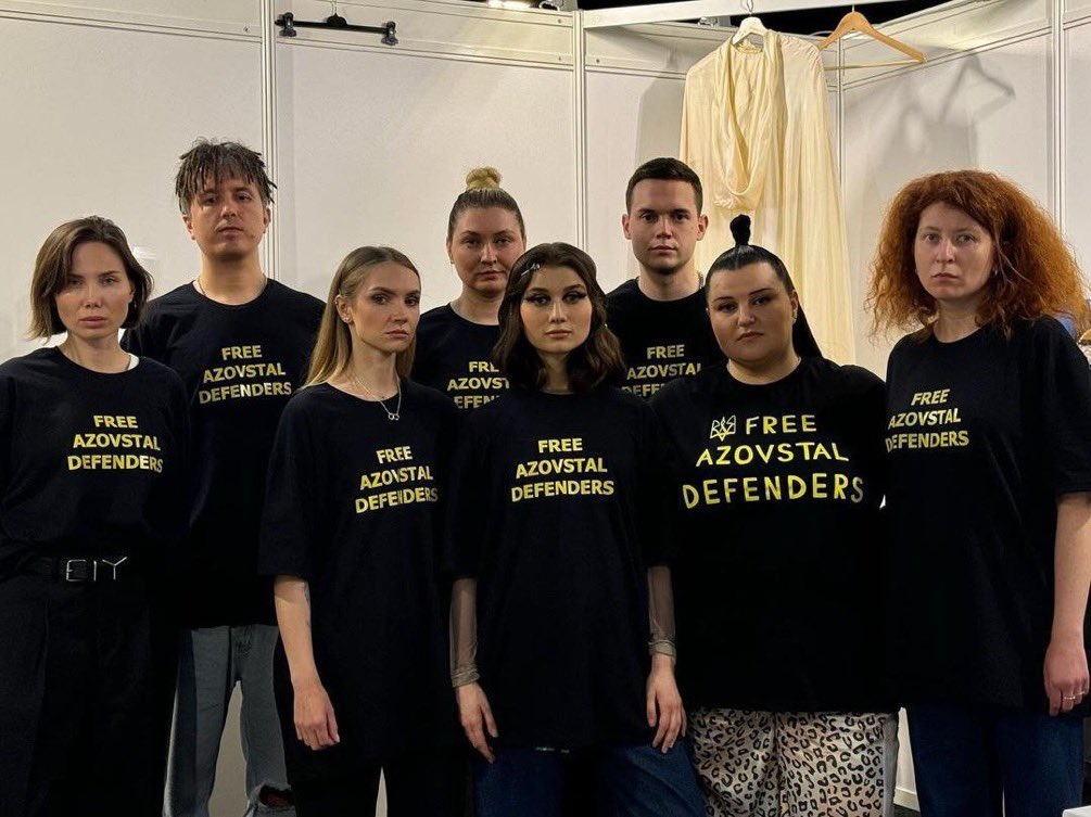 ⚡ Ukrainian Eurovision team got fined for wearing Free Azovstal Defenders t-shirts. 'We knew that when they showed replays of all the artists' performances, they would also show the delegation itself. So when the camera approached us, our team quickly revealed ourselves and