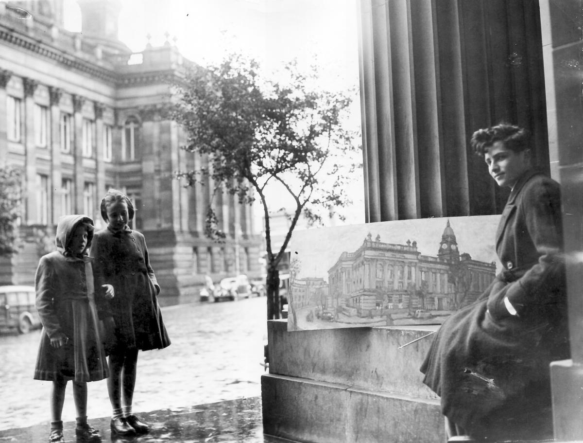 Artist Bryan Senior, pictured in September 1954 in Victoria Square Bolton, with his oil painting of the Town Hall.