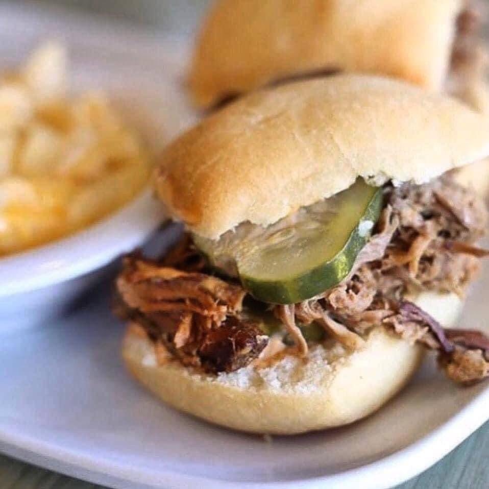 Our Big Green Eggs make tasty Chipotle Braised Pork! - Add Housemade Pickles and Aioli on Warm Yeast Rolls - A DELICIOUS choice for lunch or dinner!! #urbancookhouse #eatfresh #bigreeneggs #BuyLocalEatUrban #UC