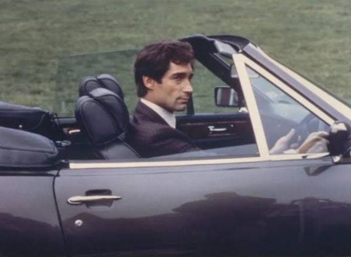 I'm not good at the car names so i'm just going to say the Aston Martin V8 🚗

With the gorgeous #TimothyDalton driving the car 🚗

The Living Daylights