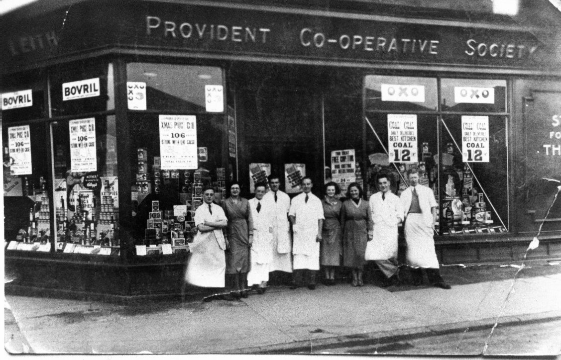 #thelmamessages Our reminiscence project on shops & retail has gathered many donations of #photos from the public including this 1935 image of Leith Provident workers on Lochend Road #edinburgh when best kitchen coal (and Bovril) was on sale! #memories #heritage #worklife