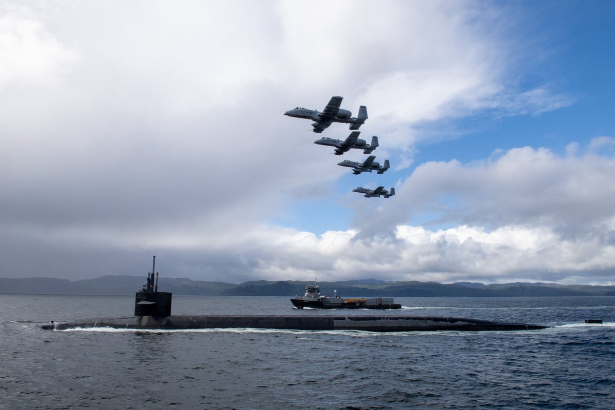 USS Nebraska (SSBN 739) transits the Strait of San Juan de Fuca with Air Force A-10 Thunderbolt II aircraft and Coast Guard vessels. Ballistic missile submarines provide strategic deterrence and the most survivable leg of the nuclear triad. 
#unmatchedpropulsion #nuclearfleet