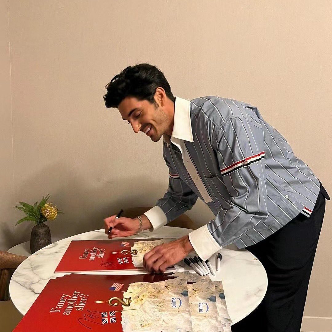 Taylor Zakhar Perez signing posters for ‘RED, WHITE & ROYAL BLUE 2’ 📸