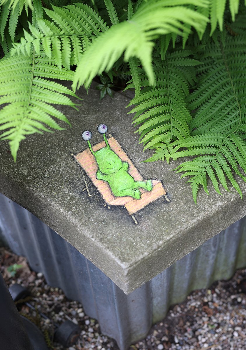 It's not easy being green, but Sluggo does enjoy the benefits of photosynthesis. #StreetArt #SidewalkChalk #3Dartwork #anamorphosis #basking #fernbathing