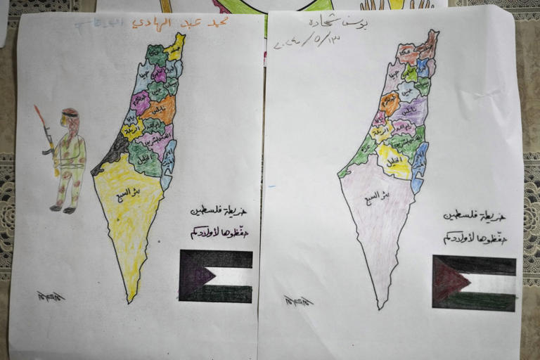 Maps of historic Palestine with Arabic writing that reads 'The map of Palestine, Have your children memorizing it', in a center of the Social Support NGO at the Palestinian refugee camp of Shatila in Beirut, Lebanon, May 15, 2024. 
#news