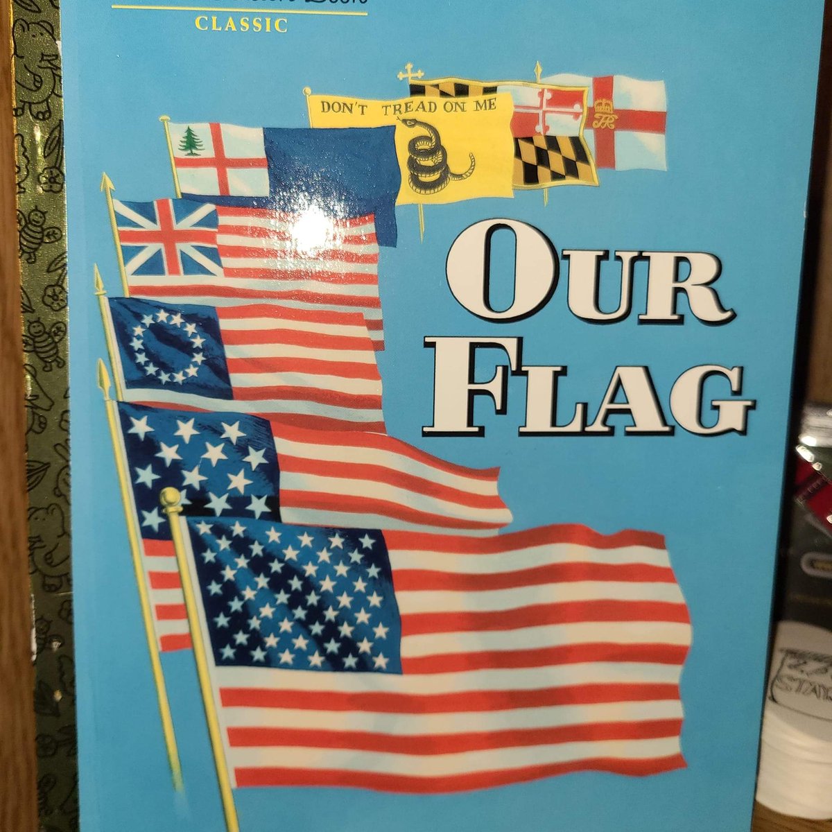 Golden book about Our Flag @ attackettadventures.shop/shop great for kids learning about our history.