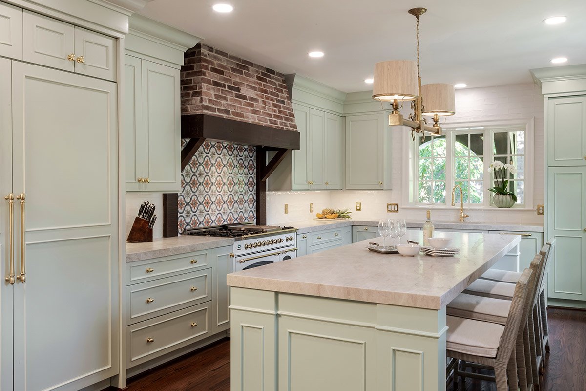 What do you think of this painted cabinet mixed with the brick hood surround?  <a href="/Showplace_Cab/">Showplace Cabinetry</a>  Savannah door style ColorSelect "Sea Salt" (SW6204) . . . #kitchen #kitchencabinets #brickhood #tilebacksplash