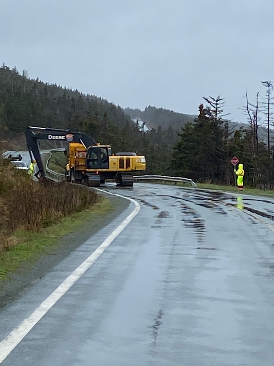 Rain or shine, the @TI_GovNL crew continues to keep our provincially operated roads safe for the travelling public. 🌧️🌞 Ditch clearing is currently underway in New Bridge (Rte. 90). Please slow your vehicle and respect traffic control measures put in place. #nltraffic #GovNL