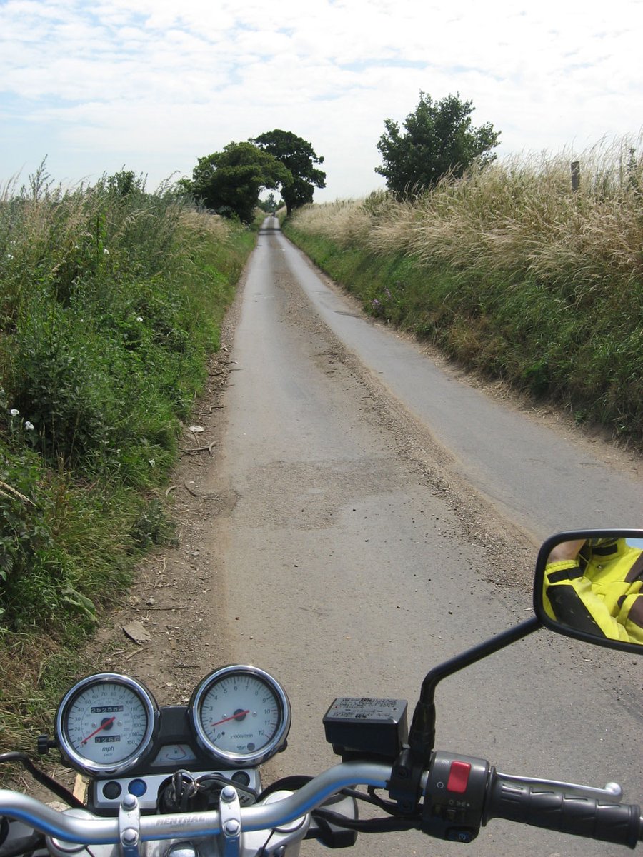 I've learned to cover the front brake with 2 fingers. 3 if like a Harley-Davidson bike it takes more force to pull the lever. But 2 just 'feels right' on my motorcycle.