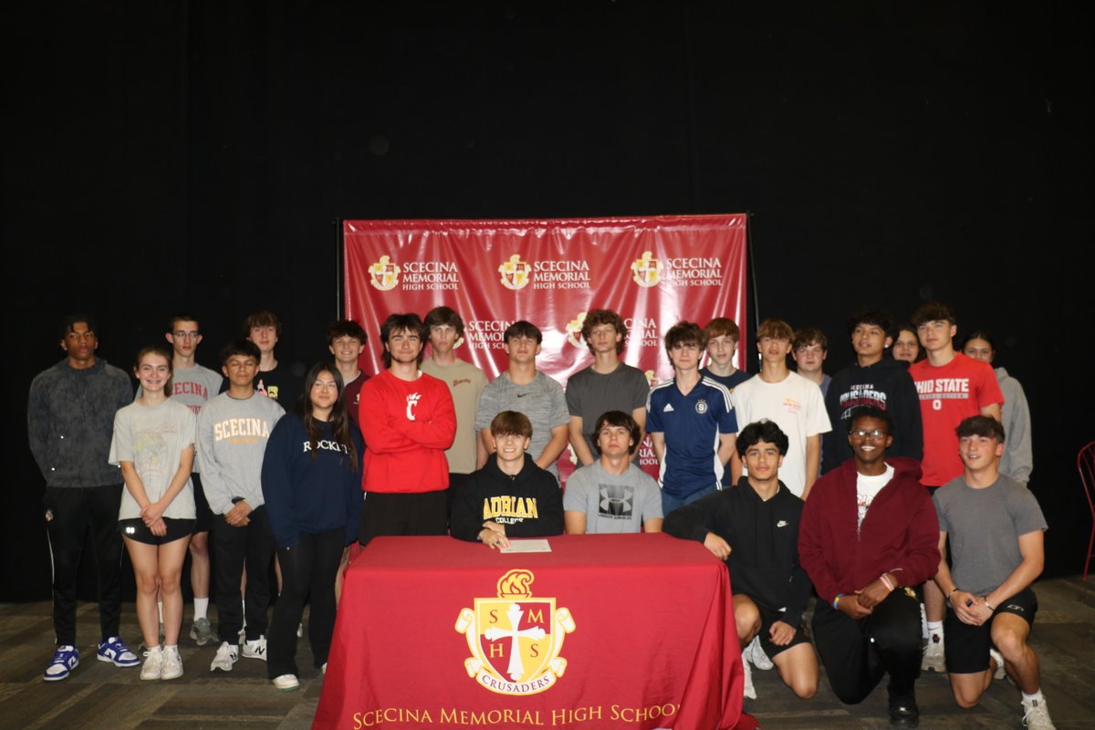 Senior Forrest Schroeder will continue his long jump career at Adrian College in Michigan. Pictured with Forrest are track and field coaches Melba Jackson and Ben Spannan, as well as his proud dad. 

<a href="/Scecina_XC_TF/">Scecina_XC_TF</a>  <a href="/SMHSathletics/">Scecina Athletics</a>  #scecina #crusaders <a href="/AdrianCollege/">Adrian College</a>
