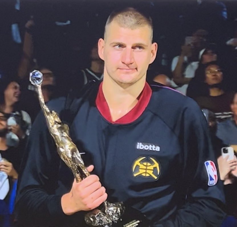 I love how Nikola Jokic’s expression is like he just won employee of the month.