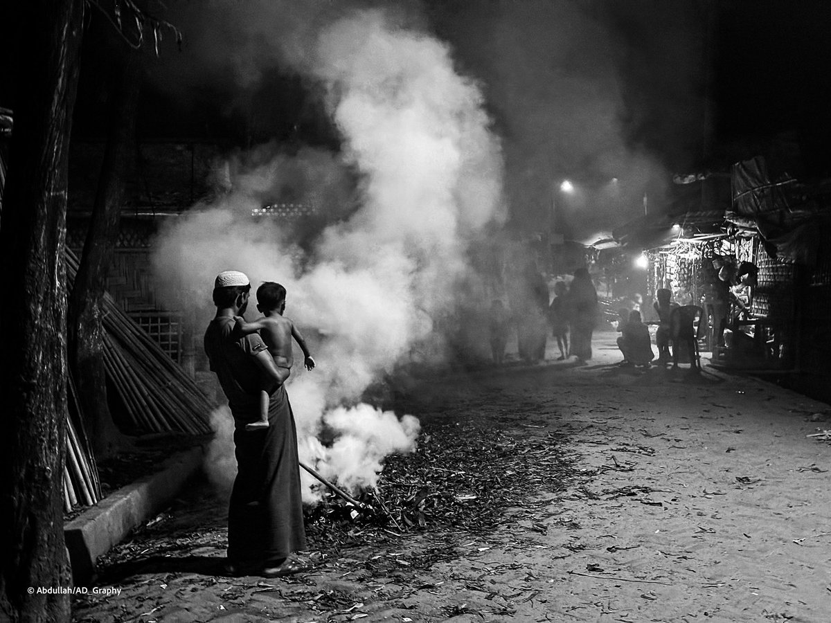 A Rohingya man setting fire to the wastes he had collected from his surrounding and this activity keeps clean the environment, reduce mosquitoes and flies. #inspiring #story #Rohingya #refugees #refugeescamp #photography #storytelling #documentary