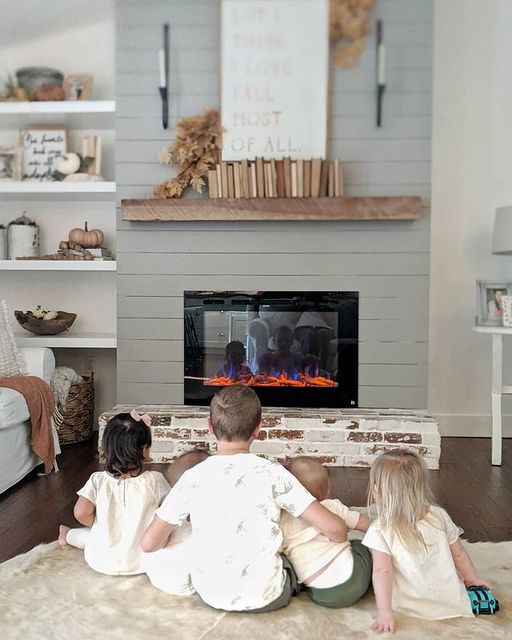 Huddle up in front of the fire with your family. Thanks White Blossom Home to for sharing her family and Sideline Elite Fireplace install. #InternationalFamilyDay