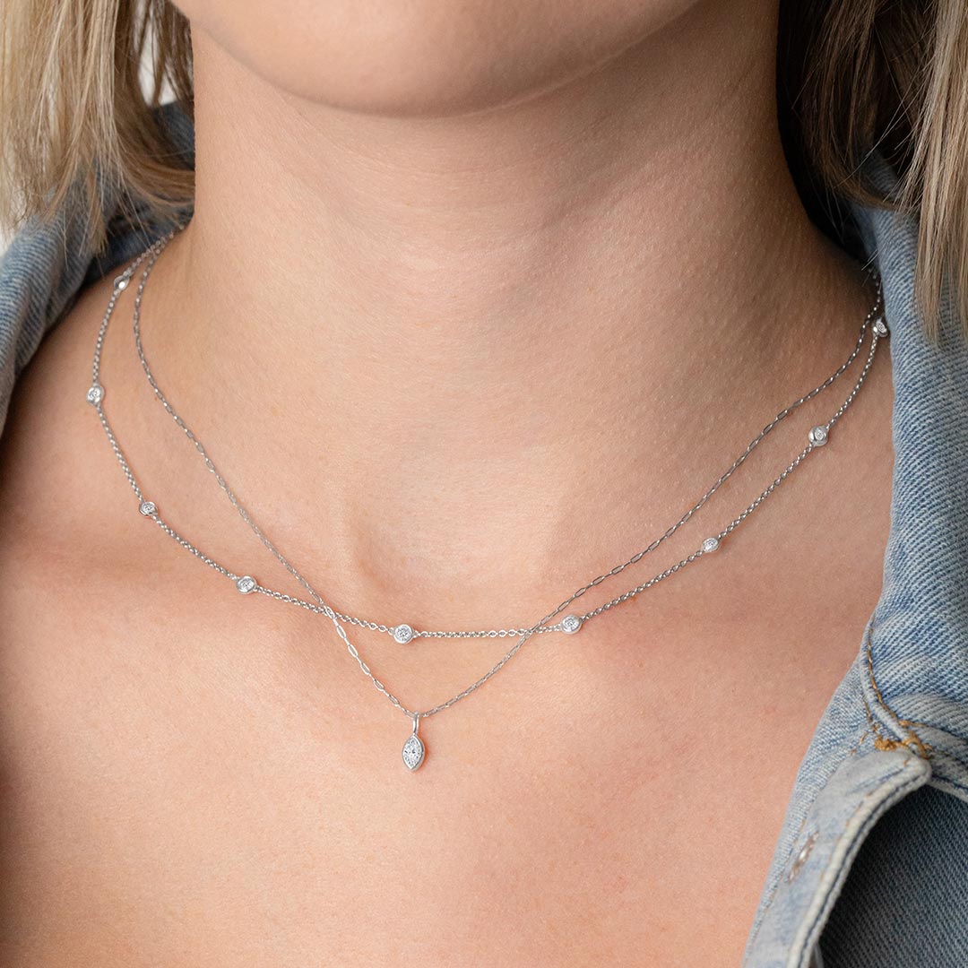 Layered to perfection. Add a touch of sparkle to your everyday style with our multi-tier diamond necklace. ✨ #StyleWithSparkle #DiamondNecklace #EverydayElegance #ASHI