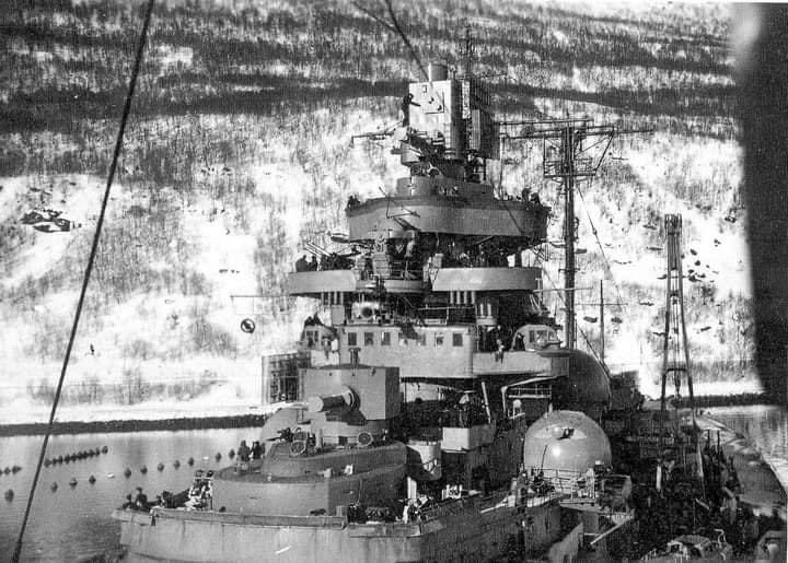 Schlachtschiff Tirpitz at anchorage in Bogen Norway circ early March 1942. She stayed here for three days before returning to Faettenfjord , the following photographs show great views of the superstructure & AA guns manned because of a possible Attacking Aircraft from carriers &