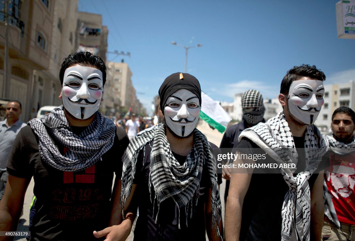 Palestinian demonstrators take part in a rally near the border with Israel, Gaza City on May 15 2014, to mark #NakbaDay. Palestinians are marking Nakba day which means in Arabic catastrophe in reference to the birth of the state of Israel 76-years-ago in British-mandate Palestine
