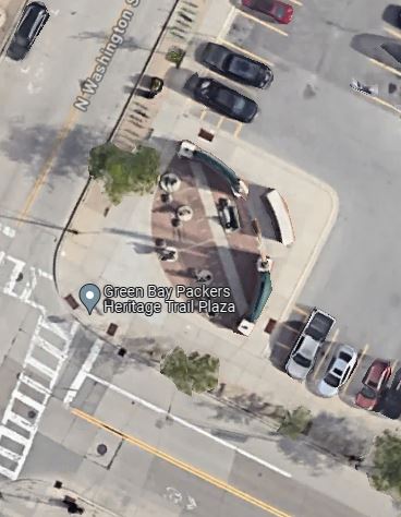 It's taken nine years of living in Green Bay for me to notice that the Packers Heritage Trail Plaza is shaped like a football. (Google Maps screenshot)
