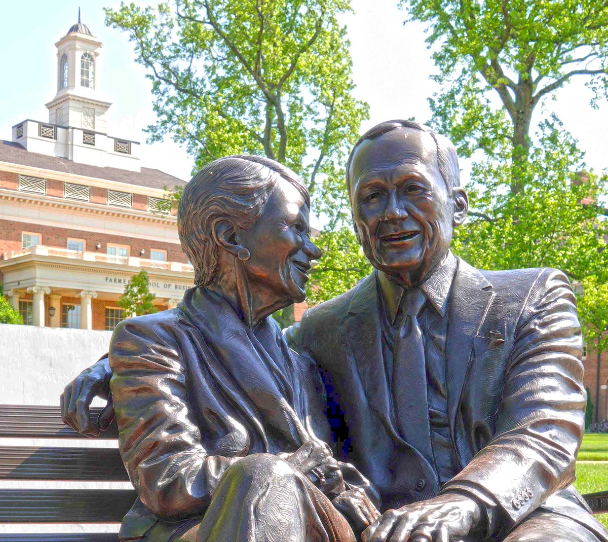 The Farmer Family Sculpture Park at the @FarmerSchoolMU was dedicated this morning, featuring a bronze sculpture of Richard (Dick) and Joyce Farmer. Richard T. Farmer, founder of the Cintas Corporation, gave the business school its name. #MyFSB #BeyondReady #MiamiOH