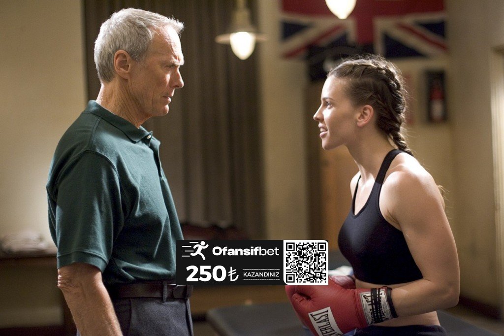 GÜNÜN FİLMİ: Million Dollar Baby (2004) - IMDb: 8.1 Frankie Dunn ringlerde yaşadığı yıllar boyunca müthiş dövüşçüler yetiştirmiştir. Öğrencisi olan boksörlere öğrettiği en önemli ders ise kendi hayatı için de temel kabul ettiği, her şeyin üzerinde kendini korumaktır.